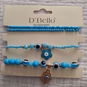 NWT 4 stretch bracelets, charms, eye flower, hand, turquoise, gold tone beads